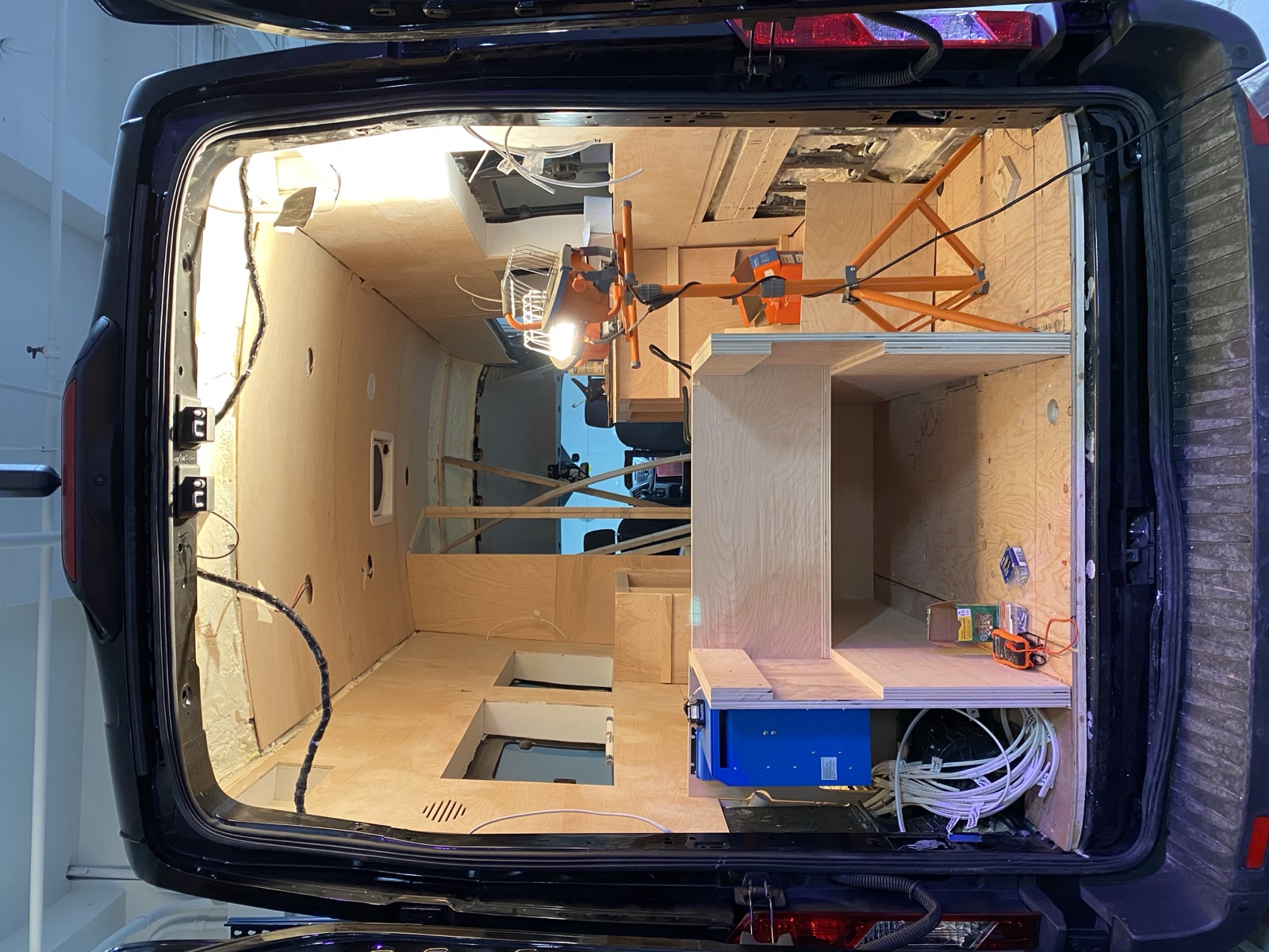 The view through the rear doors: the electrical bay and bench frames taking shape